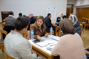 female professor explaining content in class